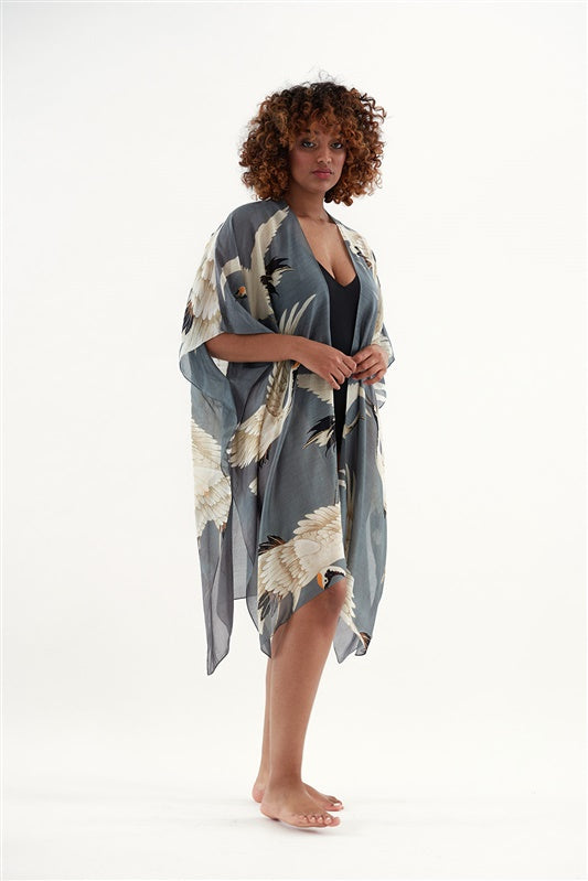 One Hundred Stars Stork Slate Throwover- These lightweight throwovers make the perfect cover up, they are mid-length with an open front and loose arms, perfect for the warmer months or worn on holiday as the ideal resort wear. 